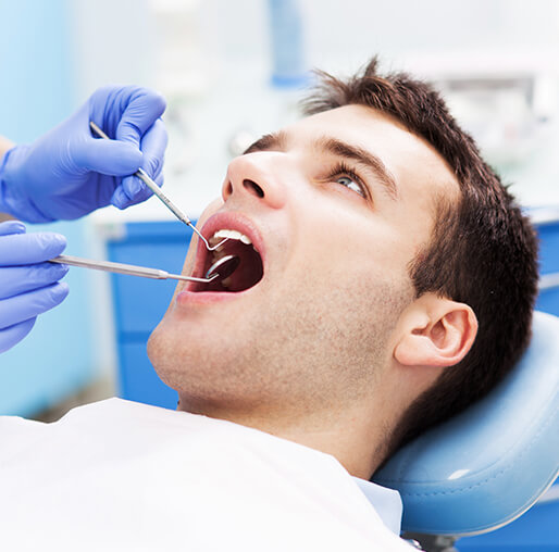 man at the dentist