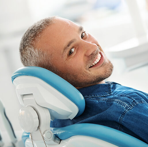 smiling man at the dentist