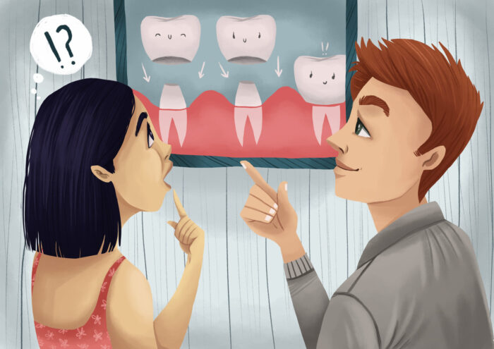 woman discussing her chipped dental crown with a dentist