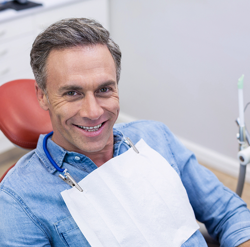 smiling man at the dentist