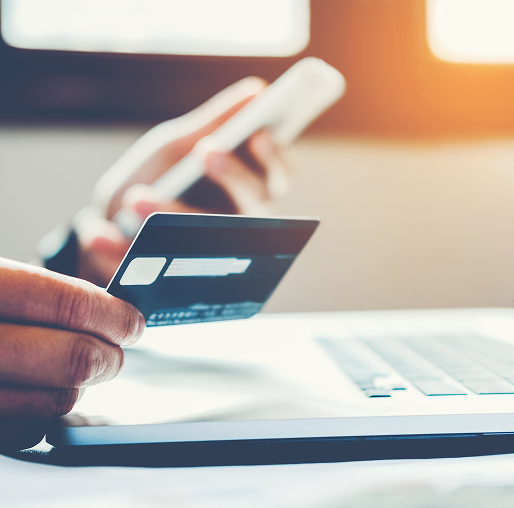 man paying bill online